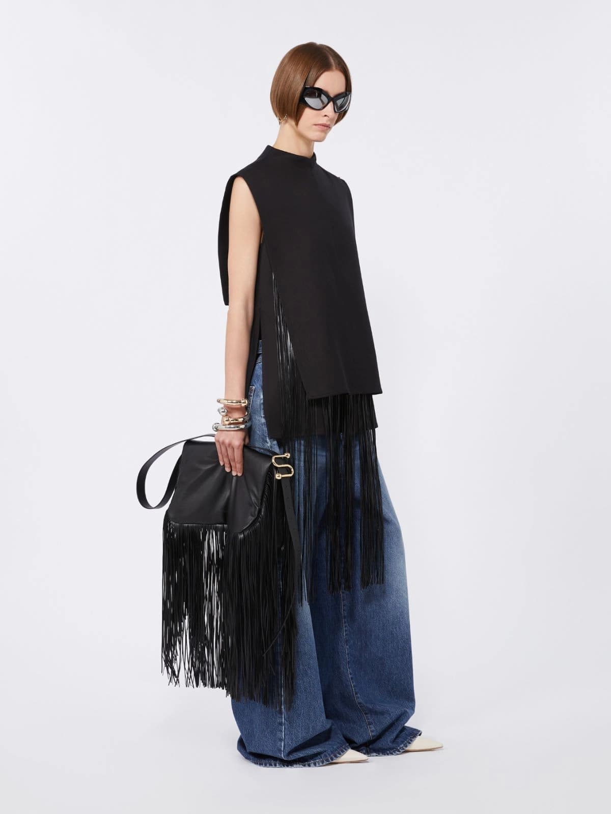 Sleeveless top with fringes